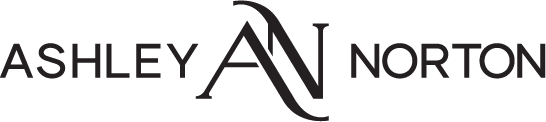 Black and white logo with the words “ASIAN NORTH” in a bold, geometric font, connected by a stylized, abstract “A” in the center. -Precision Flooring
