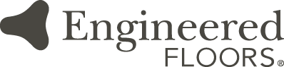The image shows the logo for Imperfect Foods in a bold, playful font with irregularly shaped letters and a stylized carrot forming the letter I. The text is dark gray on a transparent background. -Precision Flooring