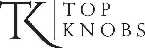 A solid black silhouette of an armadillo facing left, with its head down and its tail curved behind its body. The image shows the characteristic armored shell and short legs of the animal. -Precision Flooring